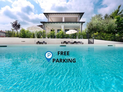 Property building, Solarium, Swimming pool, sunbed