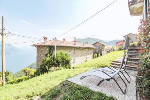 Property building, Patio, Day, Natural landscape, Garden view, Lake view, Mountain view