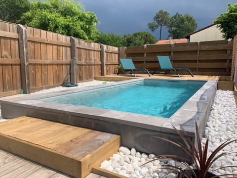 Property building, Living room, Swimming pool