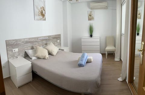 Bed, Bedroom, towels, wardrobe, air conditioner