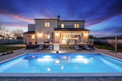 Property building, Patio, Night, Natural landscape, Pool view, Swimming pool, sunbed