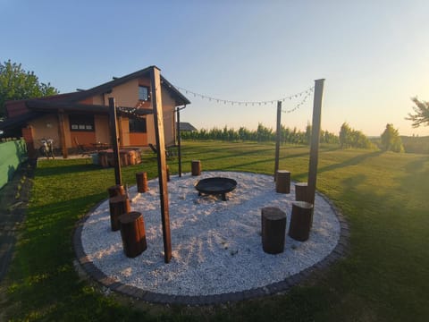 Property building, Patio, Day, Natural landscape, BBQ facilities, Garden, Garden view, Swimming pool, Sunset