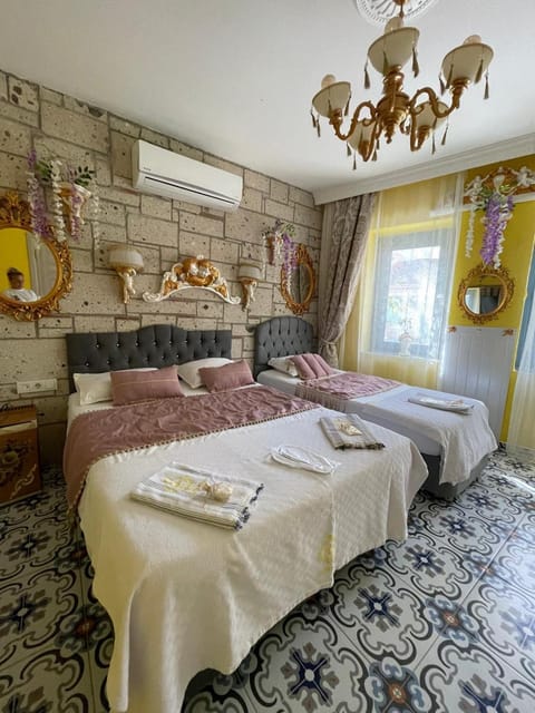 Bed, towels, air conditioner