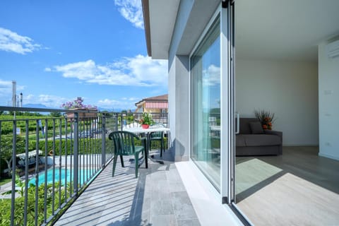 Property building, Day, Garden, View (from property/room), Balcony/Terrace, Garden view, Pool view, Swimming pool