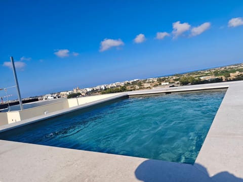 Day, Natural landscape, View (from property/room), Pool view, Sea view, Swimming pool, Swimming pool, sunbed, sunbed