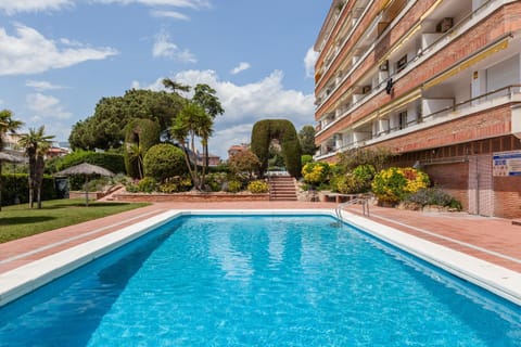 Property building, Living room, Swimming pool
