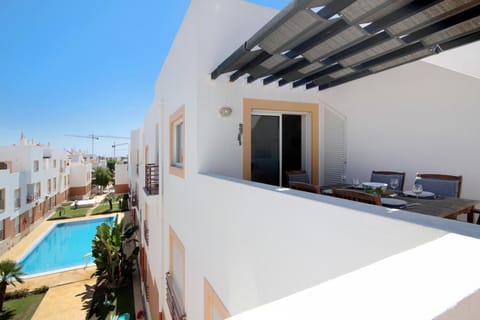 Property building, Living room, Swimming pool