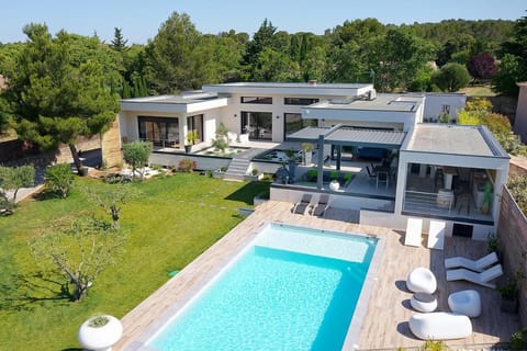 Property building, Patio, Natural landscape, Garden, Garden view, Pool view, Swimming pool, sunbed