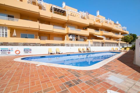 Property building, Living room, Swimming pool