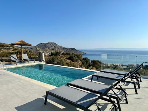 Patio, Nearby landmark, Day, Natural landscape, Mountain view, Pool view, Sea view, Swimming pool, sunbed