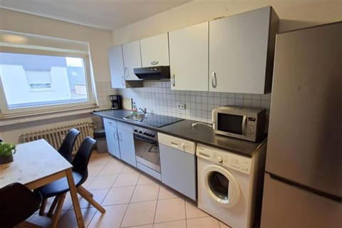 Kitchen or kitchenette, Dining area, oven, stove, washing machine