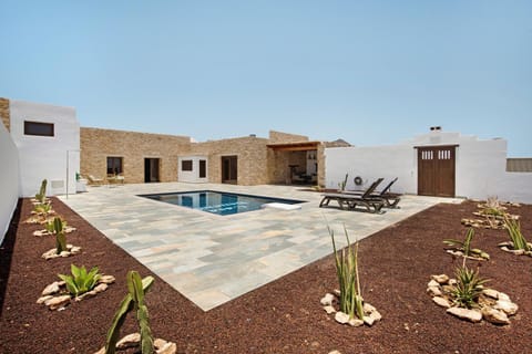 Property building, Living room, Swimming pool