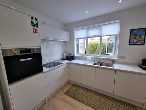 Kitchen or kitchenette, oven