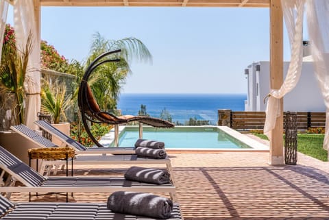 Patio, Day, Natural landscape, Summer, View (from property/room), Pool view, Sea view, Swimming pool, Time of day, sunbed