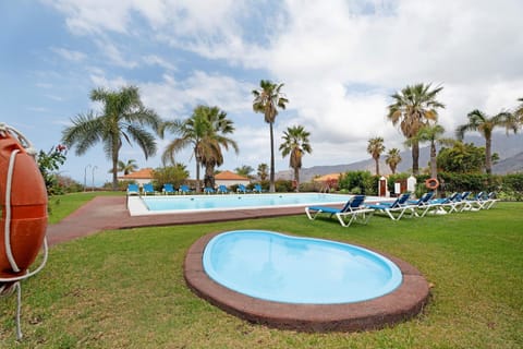 Property building, Living room, Swimming pool
