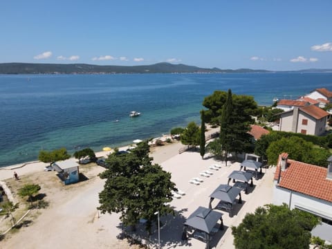 Property building, Natural landscape, Bird's eye view, Beach, Sea view
