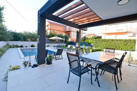 Balcony/Terrace, Seating area, Garden view, Pool view