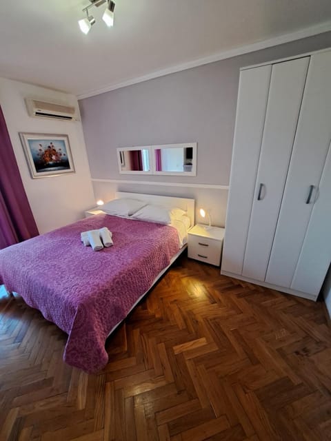 Bed, wardrobe, air conditioner