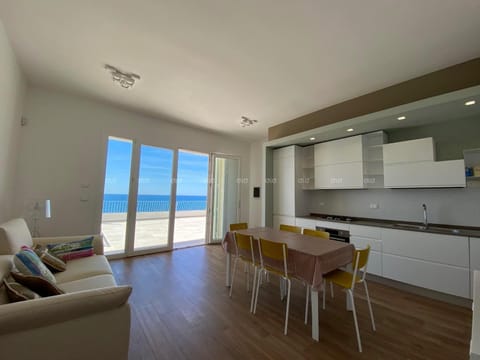 Kitchen or kitchenette, Living room, Dining area, Sea view