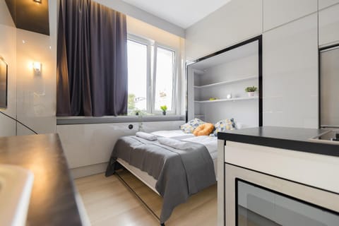 Bed, microwave, wardrobe