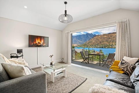 Natural landscape, TV and multimedia, Living room, Seating area, Lake view, Mountain view