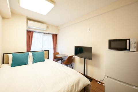 Bed, TV and multimedia, Bedroom, minibar, air conditioner