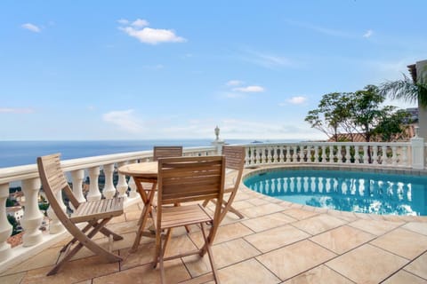 Property building, Living room, Swimming pool