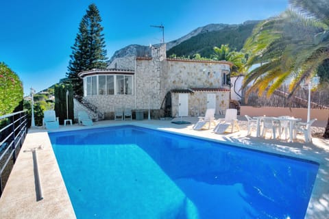 Property building, Living room, Swimming pool