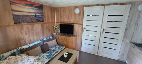 Mały domek w centrum Rowów House in Pomeranian Voivodeship