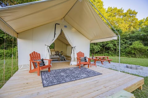 Nature's Haven with a Cozy River Escape Luxury tent in Roaring River Township