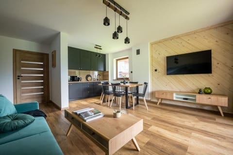 Kitchen or kitchenette, Living room, Seating area, Dining area