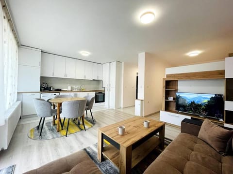 Kitchen or kitchenette, Living room, Seating area, Dining area