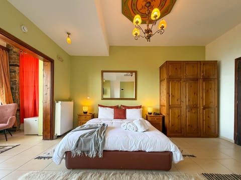 Bed, Living room, Photo of the whole room, Seating area, Bedroom, wardrobe