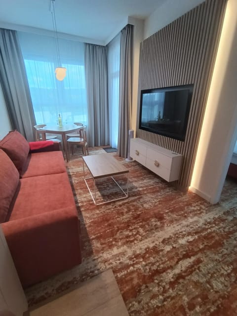 Bed, TV and multimedia, Living room, Photo of the whole room, Seating area