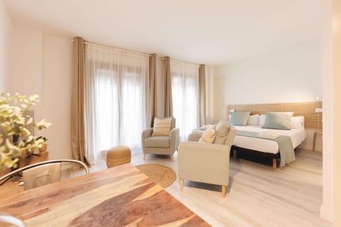 Bed, Living room, Seating area, Bedroom