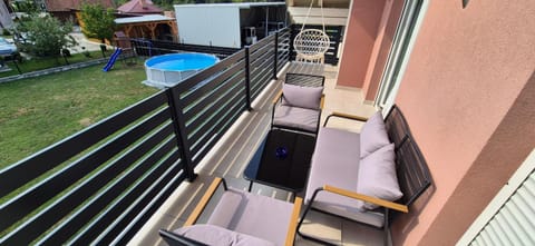 View (from property/room), Balcony/Terrace, Pool view, Swimming pool