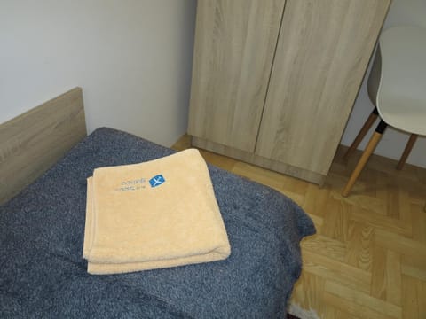 Photo of the whole room, Seating area, towels, wardrobe