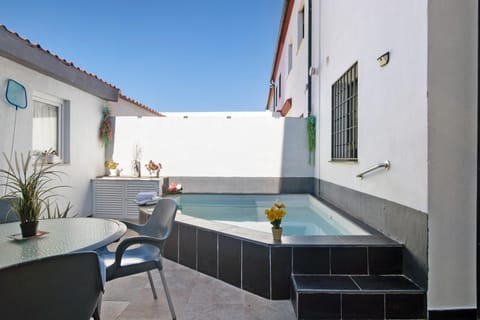 Property building, Living room, Swimming pool