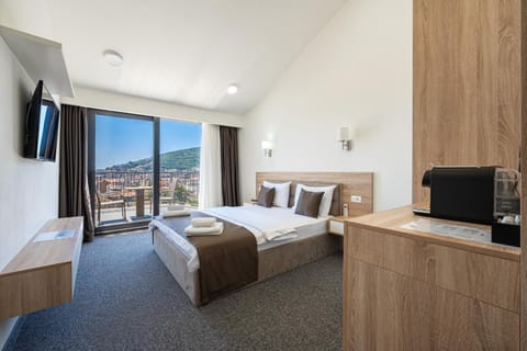 TV and multimedia, Balcony/Terrace, Kitchen or kitchenette, Bedroom, Sea view