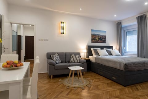Bed, Living room, Seating area