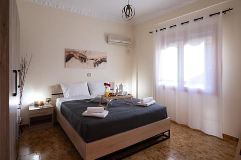 Bed, Photo of the whole room, Bedroom, towels, air conditioner