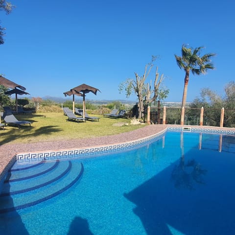 Property building, Living room, Swimming pool