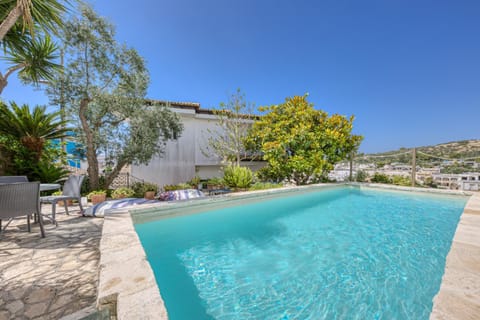 Property building, Living room, Swimming pool