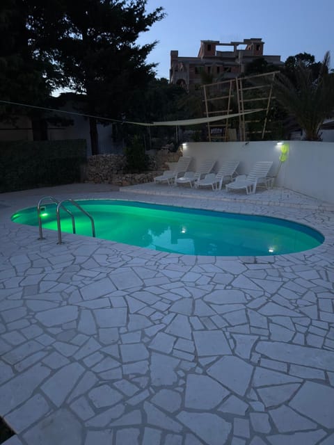 Night, Pool view, Swimming pool, sunbed