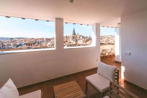 View (from property/room), Balcony/Terrace, Seating area, City view