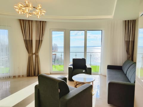 View (from property/room), Living room, Lake view, Sunrise