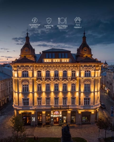 Property building, Nearby landmark, Night, Text overlay, City view, Landmark view, Location