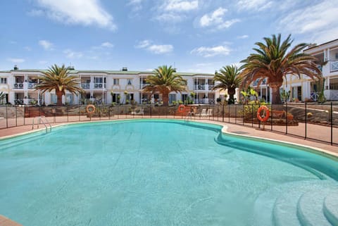 Property building, Living room, Swimming pool