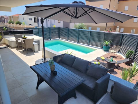 Patio, Day, View (from property/room), Seating area, Pool view, Swimming pool, sunbed