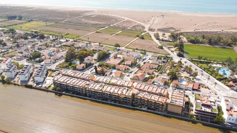 Property building, Nearby landmark, Day, Neighbourhood, Natural landscape, Bird's eye view, Beach, City view, Sea view, Street view, Location